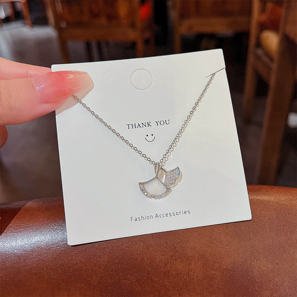 Women's Titanium Steel Copper Microinlaid Zircon Ginkgo Leaf Pendant Necklace With Diamond Design