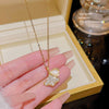 Women's Titanium Steel Ginkgo Leaf Pendant Necklace With Microinlaid Zircon And Geometric Pattern