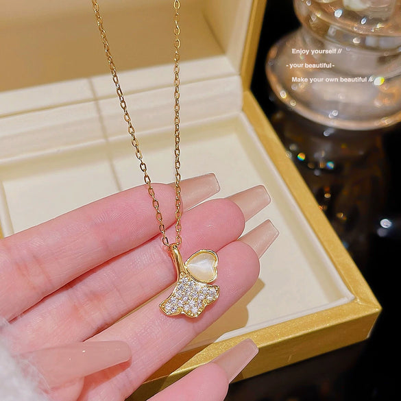 Women's Titanium Steel Ginkgo Leaf Pendant Necklace With Microinlaid Zircon And Geometric Pattern