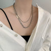 Women's Titanium Steel Stitching Design Specialshaped Baroque Pearl Necklace With Polishing Process And Bow Pattern