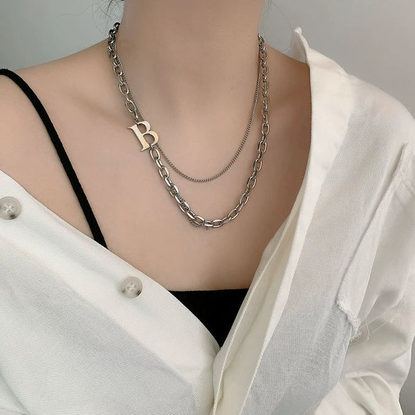 Women's Titanium Steel Stitching Design Specialshaped Baroque Pearl Necklace With Polishing Process And Bow Pattern