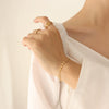 Women's Titanium Steel Wave Pattern Flower Embossed Round Bracelet Jewelry